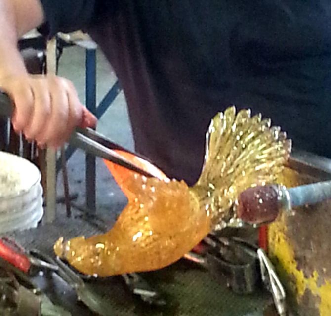 Ellegi Murano Glass: The Art of Tradition - Getting there: Faro boat stop to a glass factory courtyard