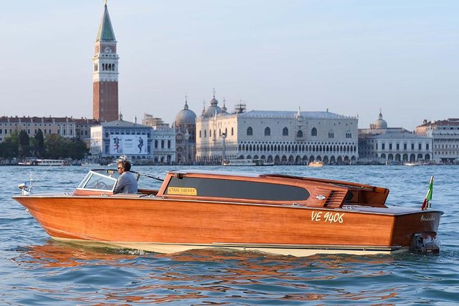 Private Arrival Transfer from Marco Polo Airport to Venice - Private water taxi on the lagoon and Canal Grande photos
