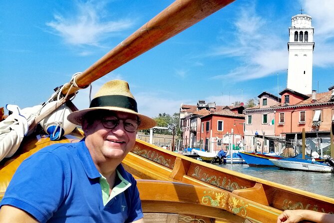 Private Boat Experience: Discover Venice from the Water - Giudecca Canal stop: your chance to steer the tour
