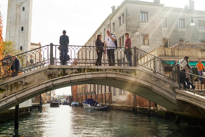 Venice Boat Tour on Grand Canal with Local Guide - The motorboat ride on the Grand Canal: fast views, better angles
