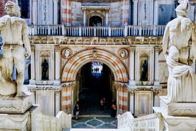 Venice Gondola ride with Skip the Line Doge's Palace tour - 30 Minutes on a Shared Classic Gondola Through the Canals