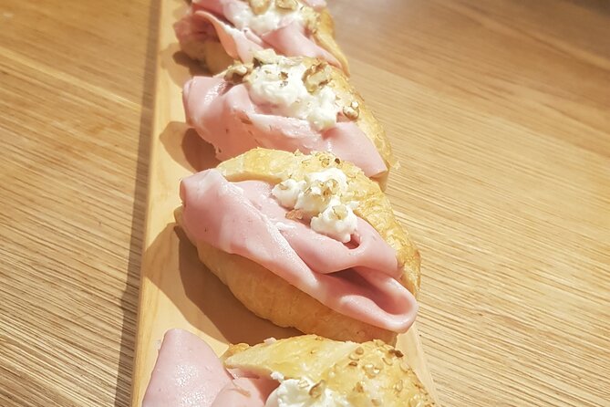 Venice like a local: Vini and Cichetti at Liuba and Hugo's home - Lugana with savory croissant, mortadella, stracchino, and pumpkin meatball